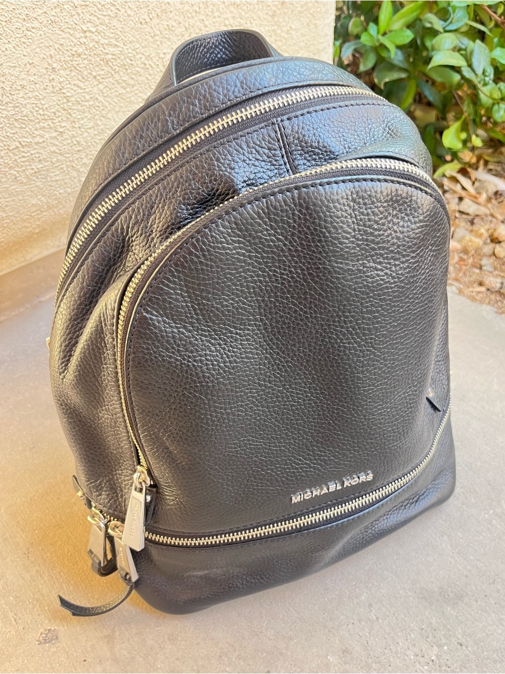 Michael Kors black leather backpack